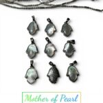 White Mother Of Pearl Hamsa Pendants